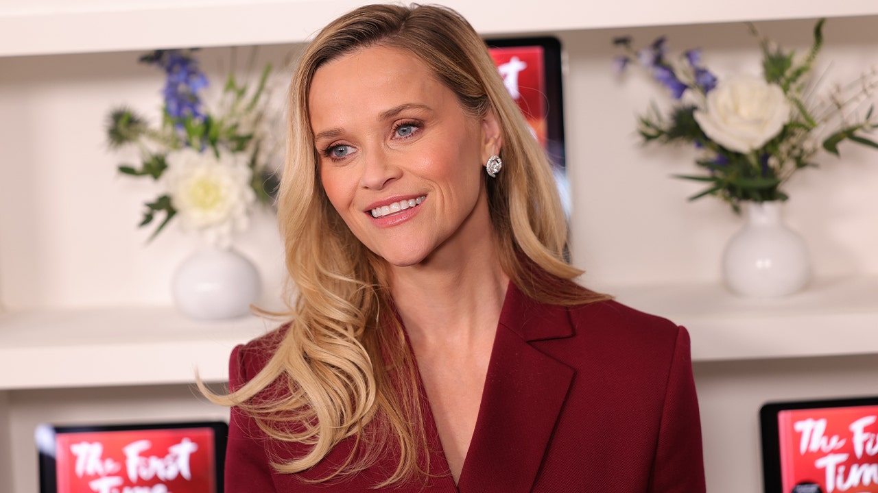 Reese Witherspoon turns 50 at Lainey Wilson's Nashville bar