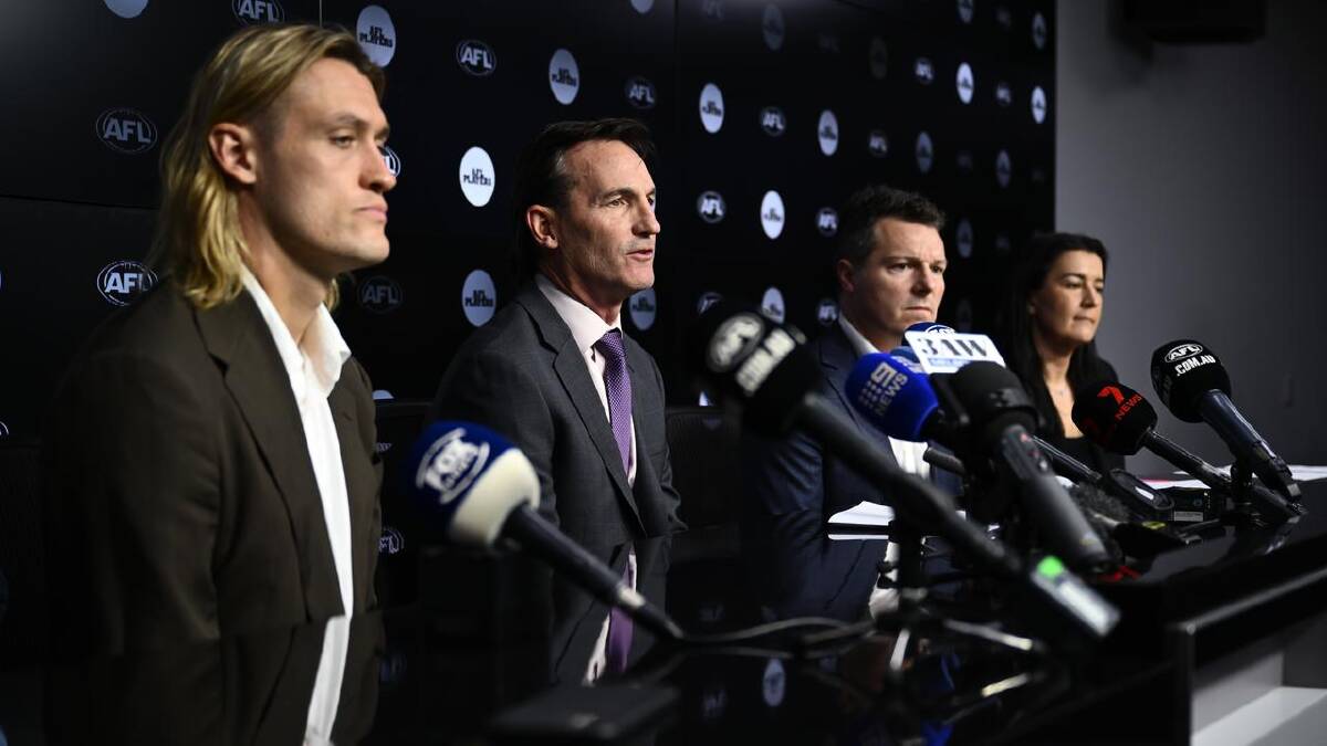 Dillon is flanked by Darcy Moore (l), James Gallagher and Laura Kane at the press conference. (Joel Carrett/AAP PHOTOS)