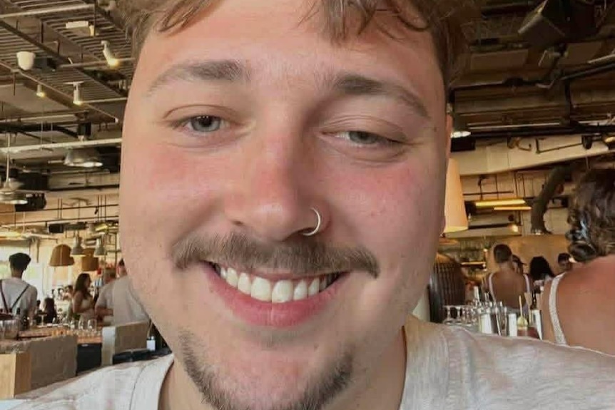 A photo of Aidan Becker smiling