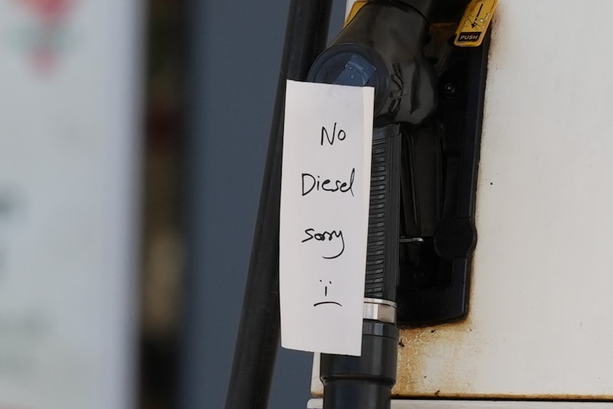A handwritten sign reading "no diesel sorry" on a petrol pump.