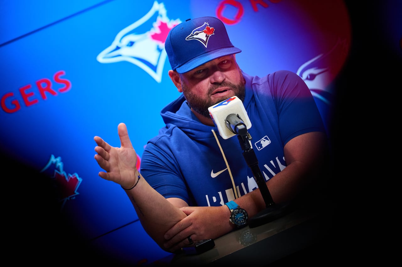 A man speaks at a podium.