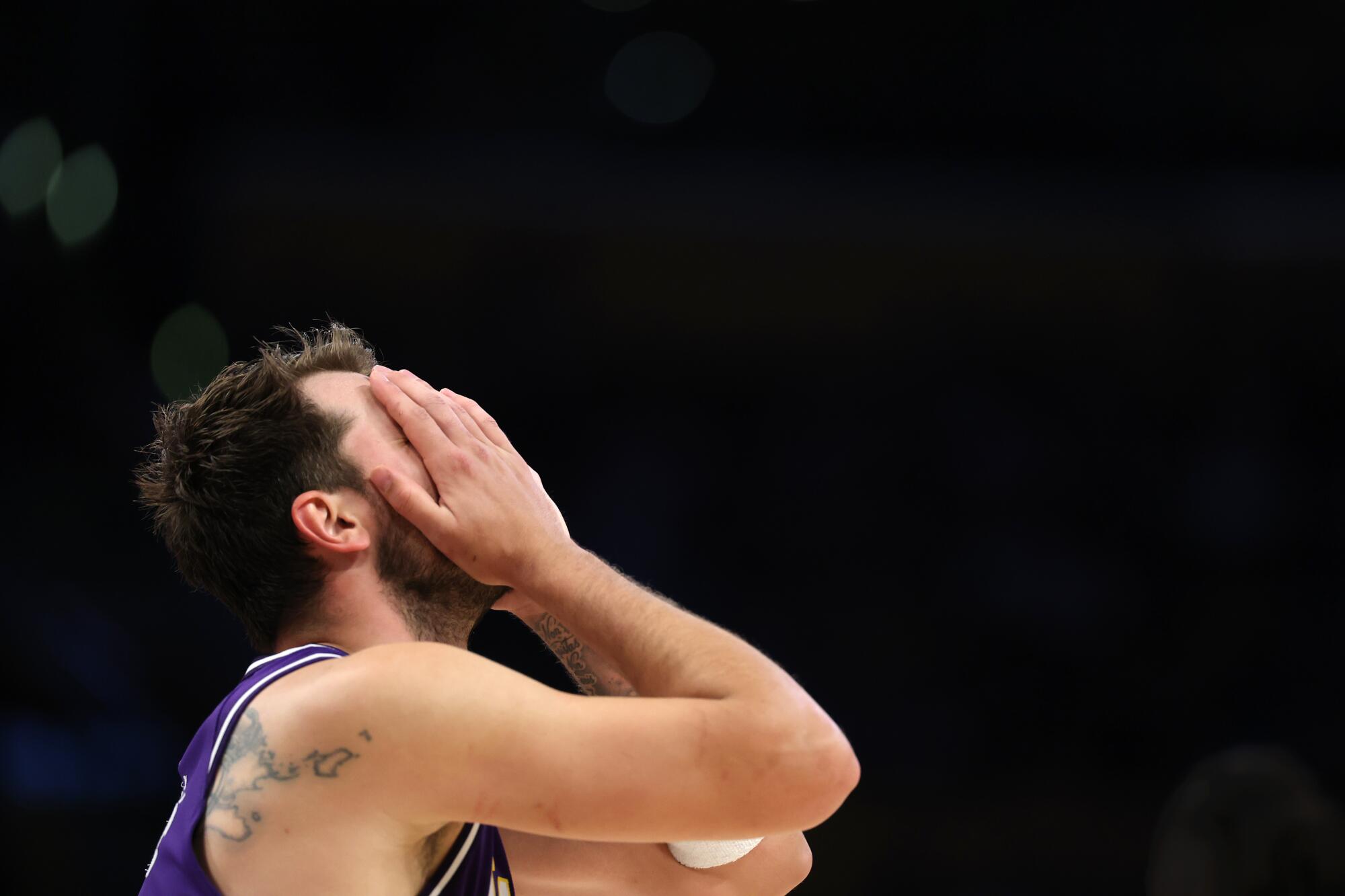 Lakers star Luka Doncic reacts to a referee's call during the second half Friday against the Brooklyn Nets.