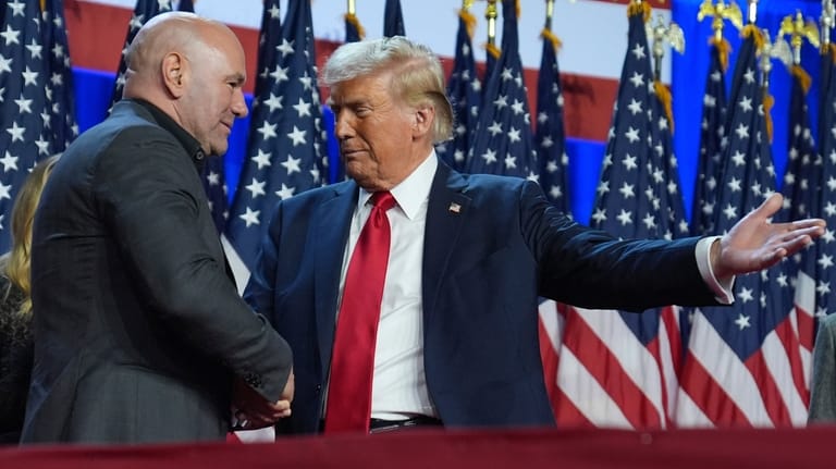 Republican presidential nominee former President Donald Trump talks with UFC...