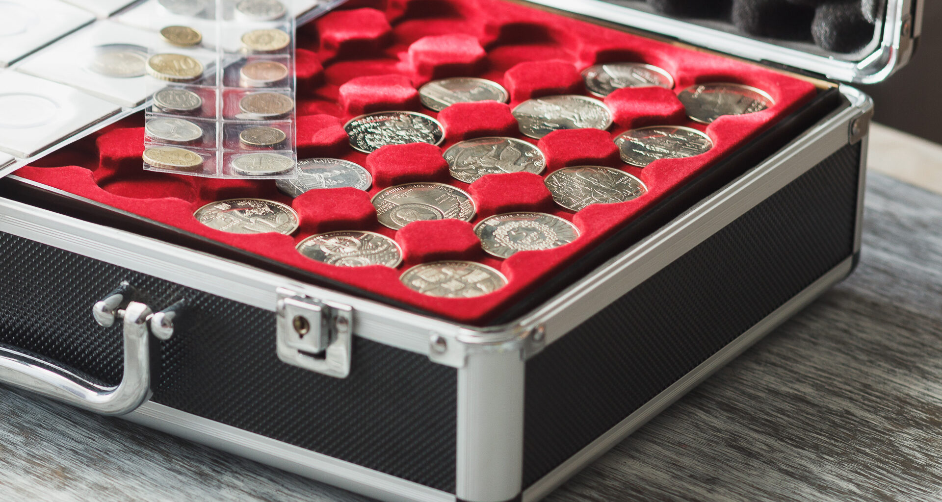 A case showcasing rare and valuable coins from a collector.