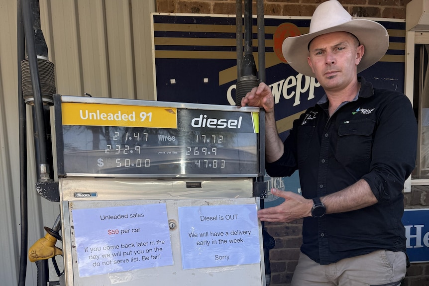 Nathan Falvo near a fuel pump.