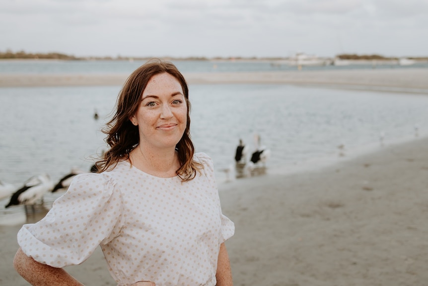 woman standing on beach