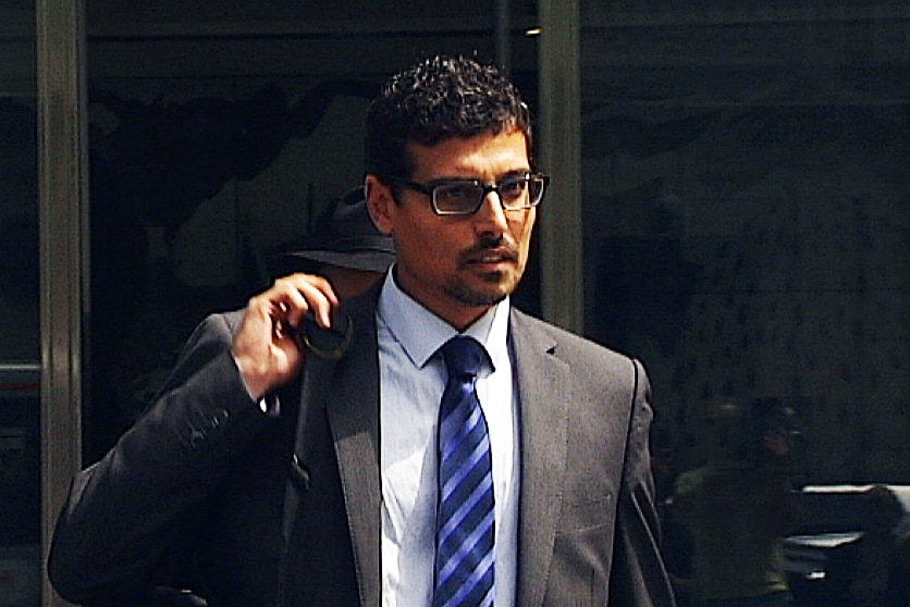 Man in suit and tie.