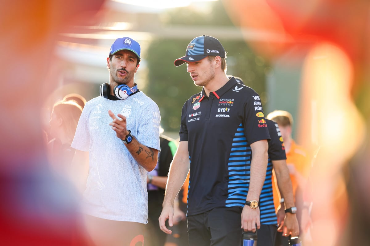 Max Verstappen and Daniel Ricciardo talking at the 2024 Singapore Grand Prix