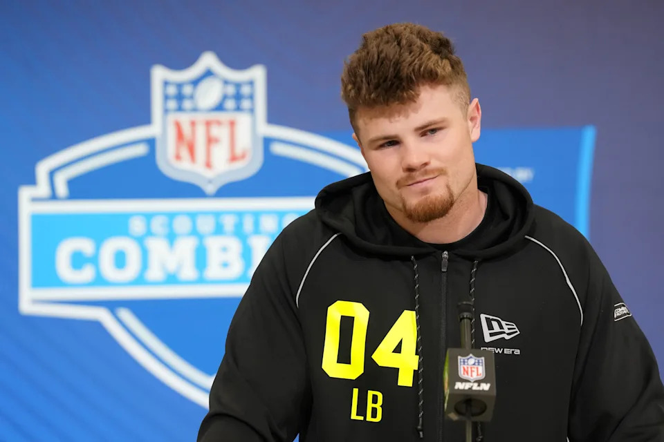 Feb 25, 2026; Indianapolis, IN, USA; Oregon linebacker Bryce Boettcher (LB04) speaks during the NFL Scouting Combine at the Indiana Convention Center. Mandatory Credit: Kirby Lee-Imagn Images