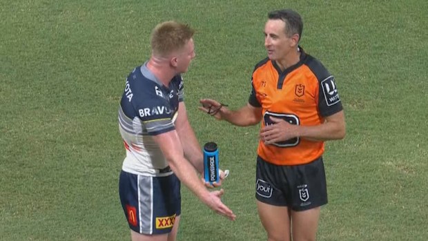 Tom Dearden argues with referee Gerard Sutton about a Bunker call.