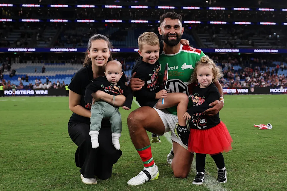 Pictured here, Rabbitohs star Alex Johnston and family celebrating his extraordinary milestone. 