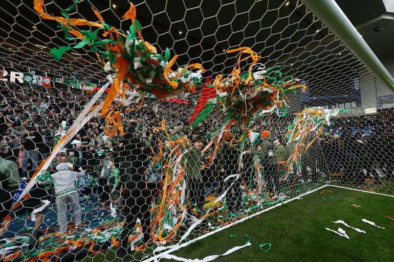 Soccer Football - Scottish League Cup - Quarter Final - Rangers v Celtic - Ibrox, Glasgow, Scotland, Britain - March 8, 2026 Celtic fans celebrate after the match Action Images via REUTERS/Lee Smith