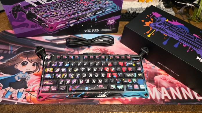 Keyboard showing the separate cable and funky art box.