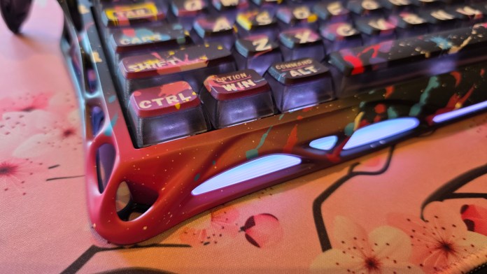 Side of the keyboard showing the aluminium frame and paint.