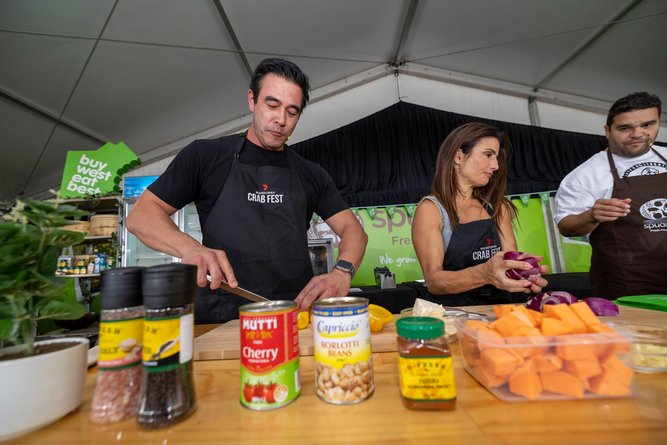 Ada Nicodemou and James Stewart from Home and Away were put to work during a cooking demonstartion with radio DJ Pete Curulli. Picture: Gary Ramage