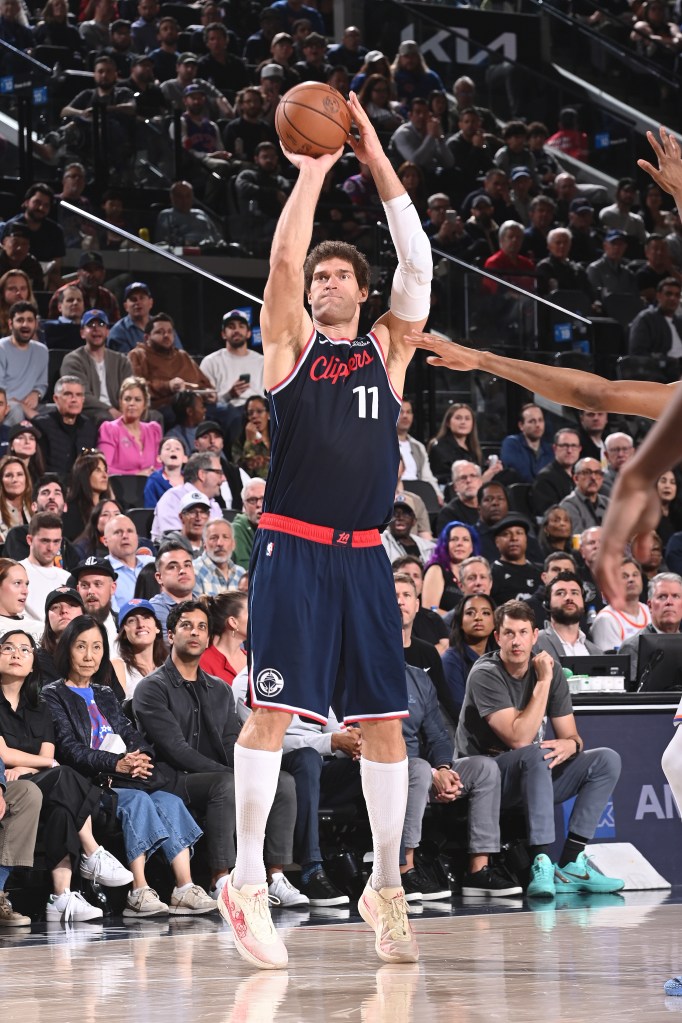 Brook Lopez shoots a 3-point basket