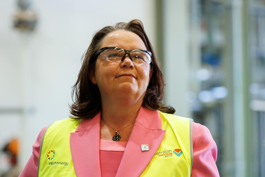 Close up of a woman in high vis.