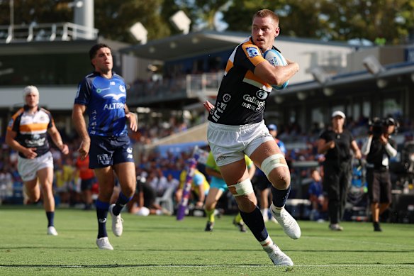 Charlie Cale scores one of his two tries against the Western Force in round one.