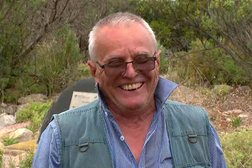 Missing kayaker Goran Radic is wearing sunglasses and smiling 