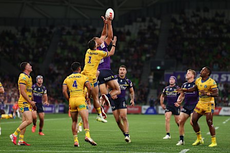 Will Warbrick of the Storm and Isaiah Iongi of the Eels contest the ball.