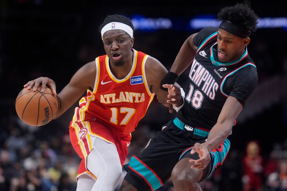 Atlanta Hawks forward Onyeka Okongwu (17) drives against Memphis Grizzlies forward...