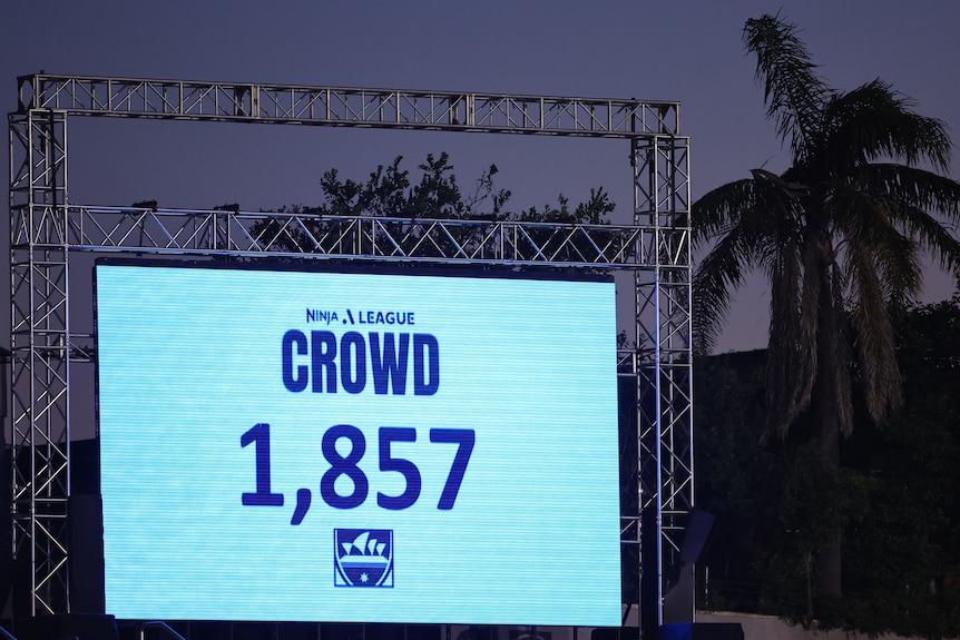 An electronic sign with a blue background, with the number 1857 on it.