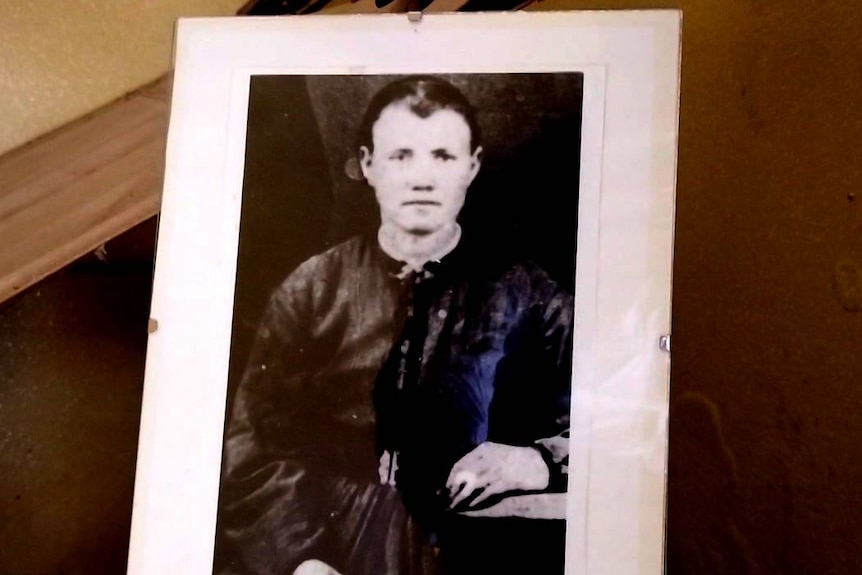 Black and white photo of a young woman.