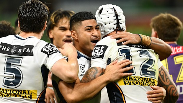 Josiah Karapani of the Broncos celebrates with try-scorer Jordan Riki #12 during the round three NRL match between the Melbourne Storm and Brisbane Broncos at AAMI Park on March 20, 2026 in Melbourne, Australia. (Photo by Quinn Rooney/Getty Images)
