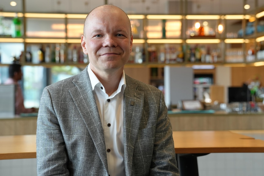 A man in a grey suit