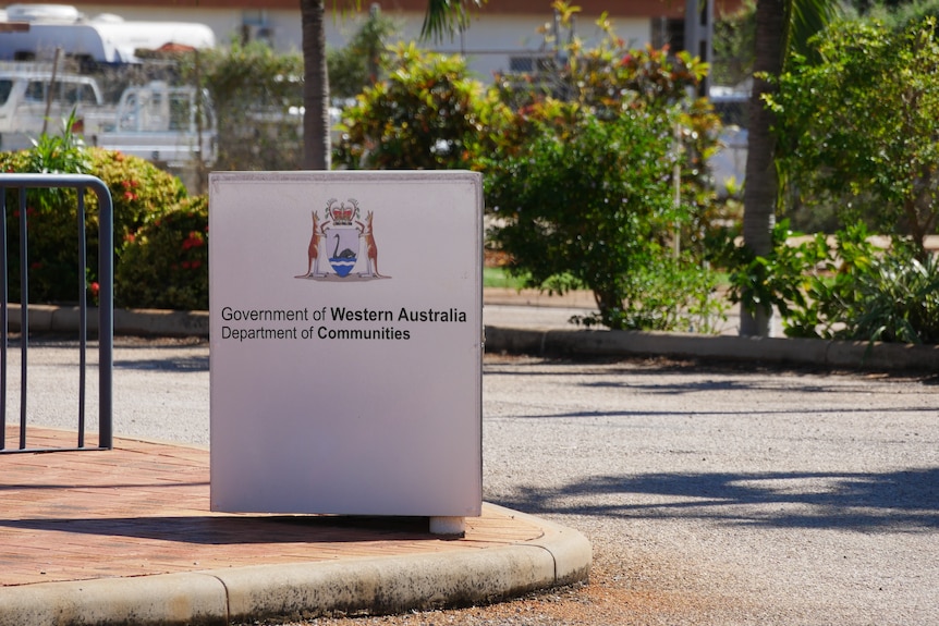 A sign that says government of western australia department of communities.