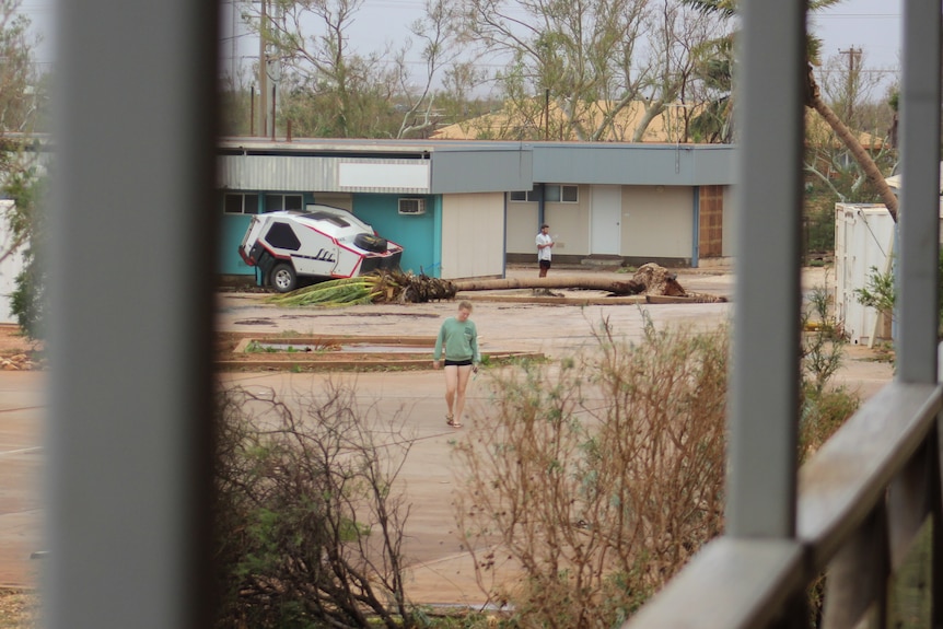 Residents walk around accomodation