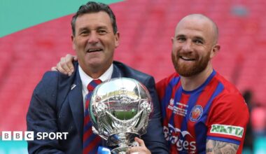 Tommy and Theo Widdrington with the FA Trophy