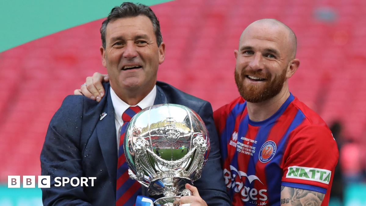 Tommy and Theo Widdrington with the FA Trophy