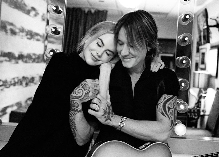 Nicole Kidman and Keith Urban sharing a tender moment, highlighting news about their divorce and relationship. Nicole Kidman and Keith Urban sharing a tender moment, highlighting news about their divorce and relationship.