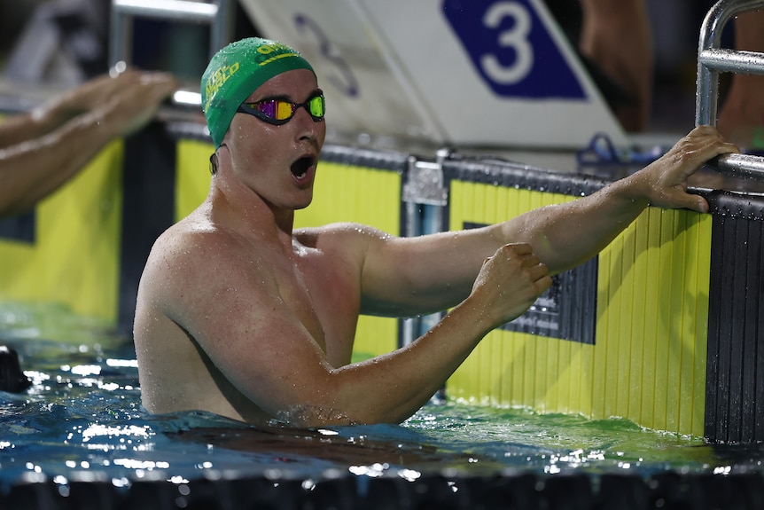 Swimmer Cam McEvoy celebrates by punching the air