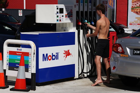 A motorist fills up in the Sydney suburb of Matraville on March 13.