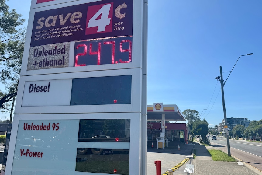 Petrol station bowsers and signs showing fuel has run out