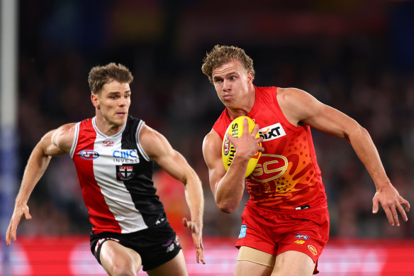 One eye on the game, one on who will be the sub: Gold Coast’s Jed Walter.