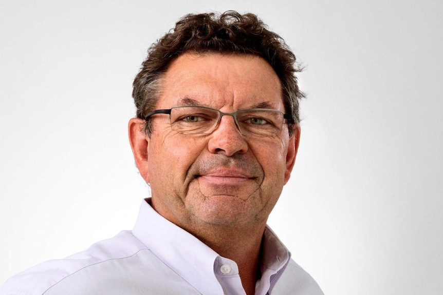 A man wearing glasses.