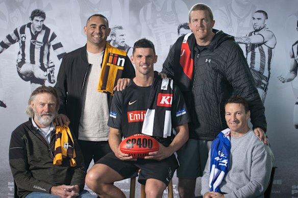 The 400 club (from left): Michael Tuck (426 games), Shaun Burgoyne (407), Scott Pendlebury (played his 427th on Saturday night), Dustin Fletcher (400) and Brent Harvey (432). Only Kevin Bartlett (403), who was unavailable, was missing from the exclusive club when this photo was taken.