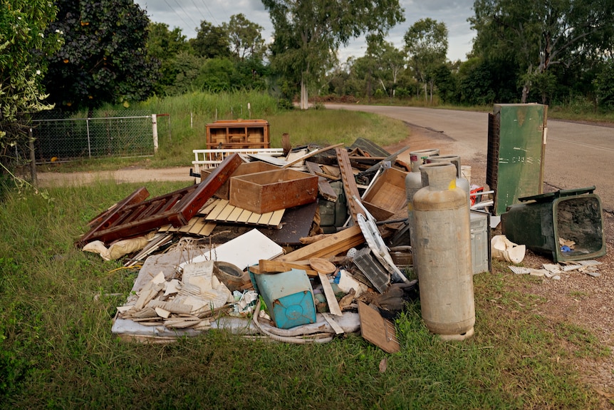 Damaged household goods on the side of Shadforth Road.