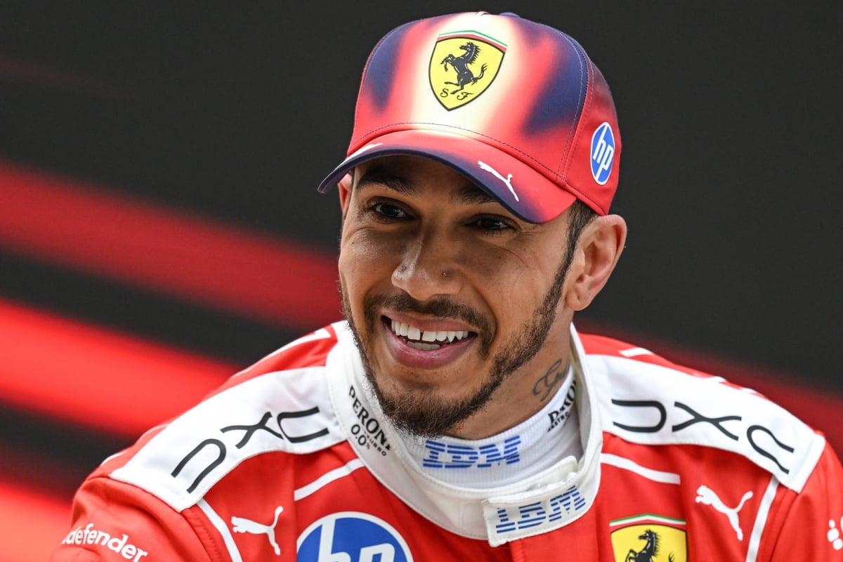 Lewis Hamilton grinning at the 2026 Chinese Grand Prix