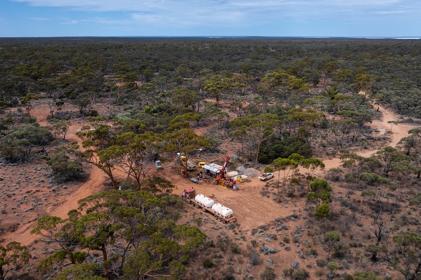 An aerial view of a drill rig working in bush landscape. 