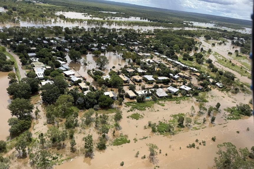 An aerial image of flooding around homes in a residential area.