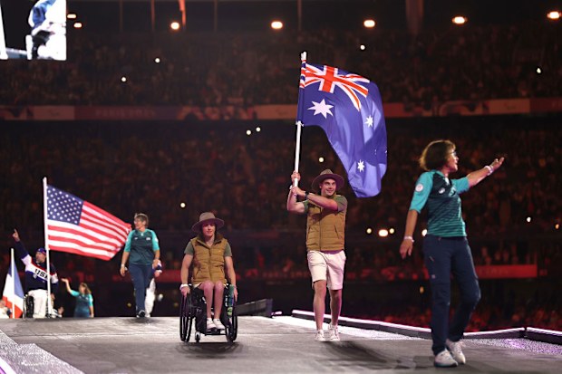 Lauren Parker and James Turner, flag Bearers of Team Australia.
