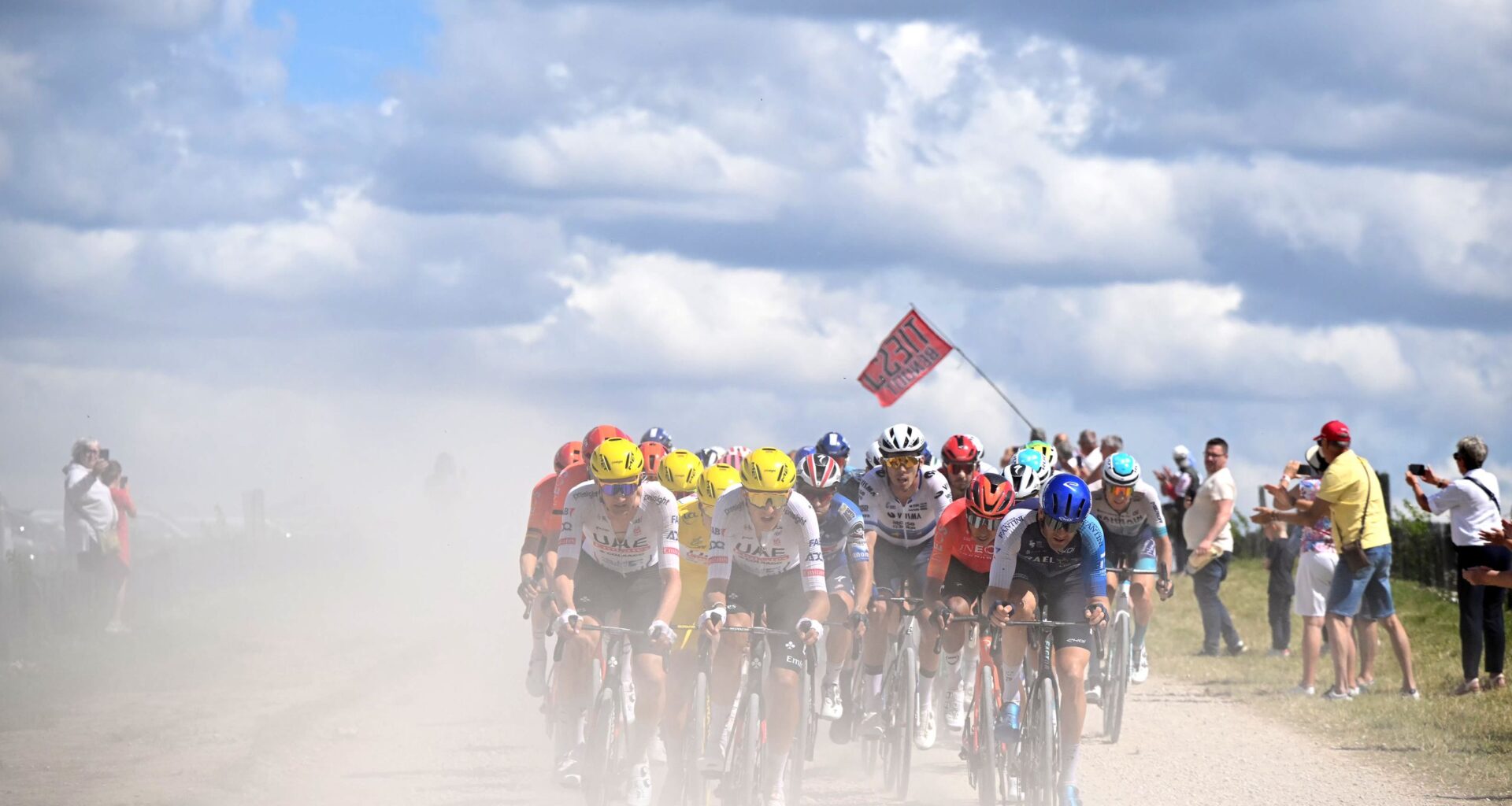 TROYES, FRANCE - JULY 07: (L-R) Tim Wellens of Belgium, Tadej Pogacar of Slovenia - Yellow Leader Jersey, Marc Soler of Spain and UAE Team Emirates, Egan Bernal of Colombia and Team INEOS Grenadiers and Hugo Houle of Canada and Team Israel - Premier Tech compete passing through a gravel strokes sector during the 111th Tour de France 2024, Stage 9 a 199km stage from Troyes to Troyes / #UCIWT / on July 07, 2024 in Troyes, France. (Photo by Bernard Papon - Pool/Getty Images)