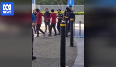 Iranian football player led onto bus from hotel