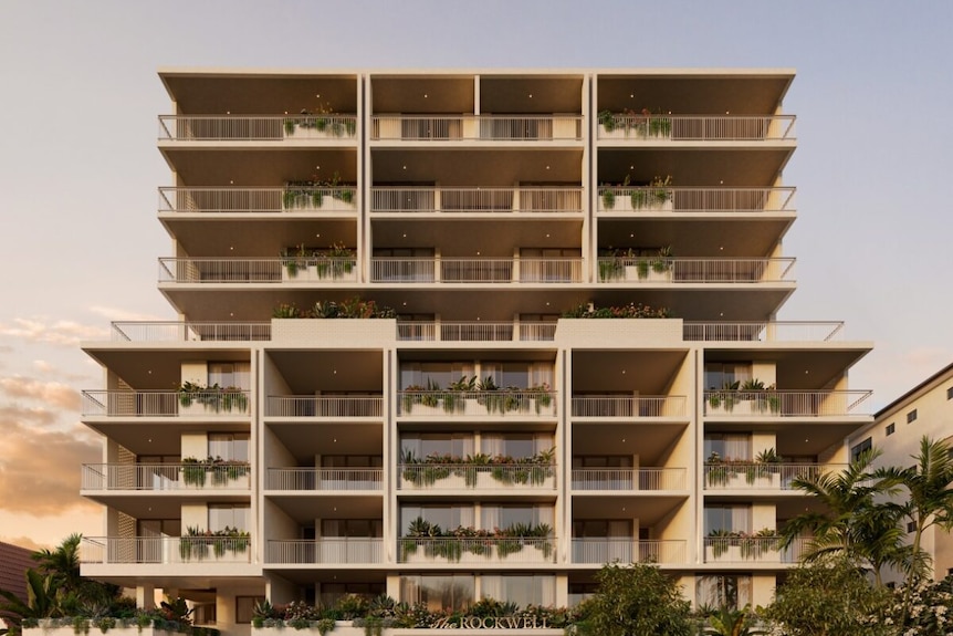 A rendered image of a multi-storey apartment complex. 