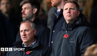 Neil Adams and Ben Knapper in the stands at Carrow Road