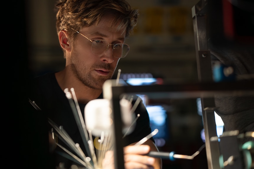 A man sits in a lab.